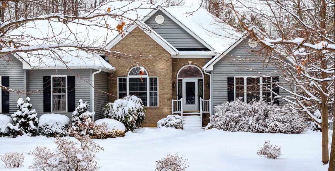 Home covered in snow in the winter