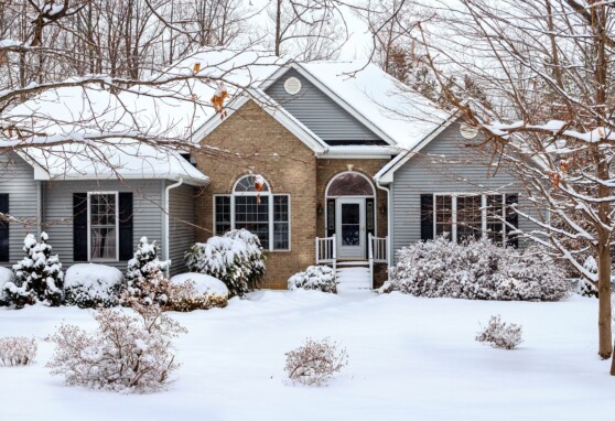 Home covered in snow in the winter