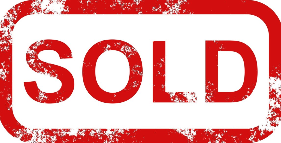SOLD sign in red