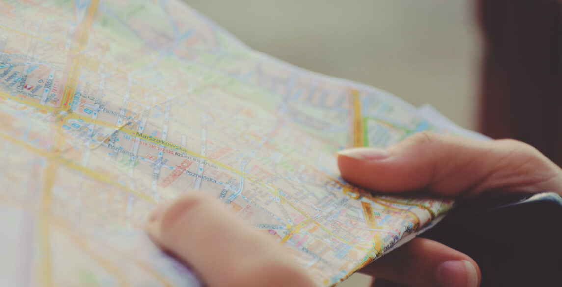 Person holding a map