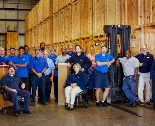 Hilldrup team in a warehouse