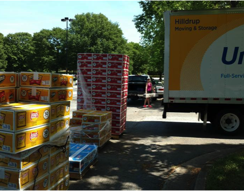 Pallets of chips being loaded onto United moving truck