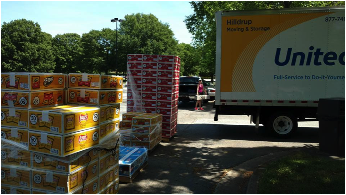 Pallets of chips being loaded onto United moving truck