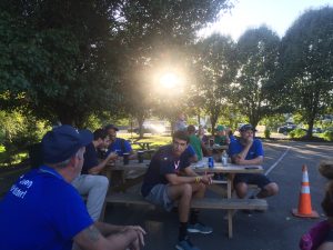 Employees enjoy lunch outside