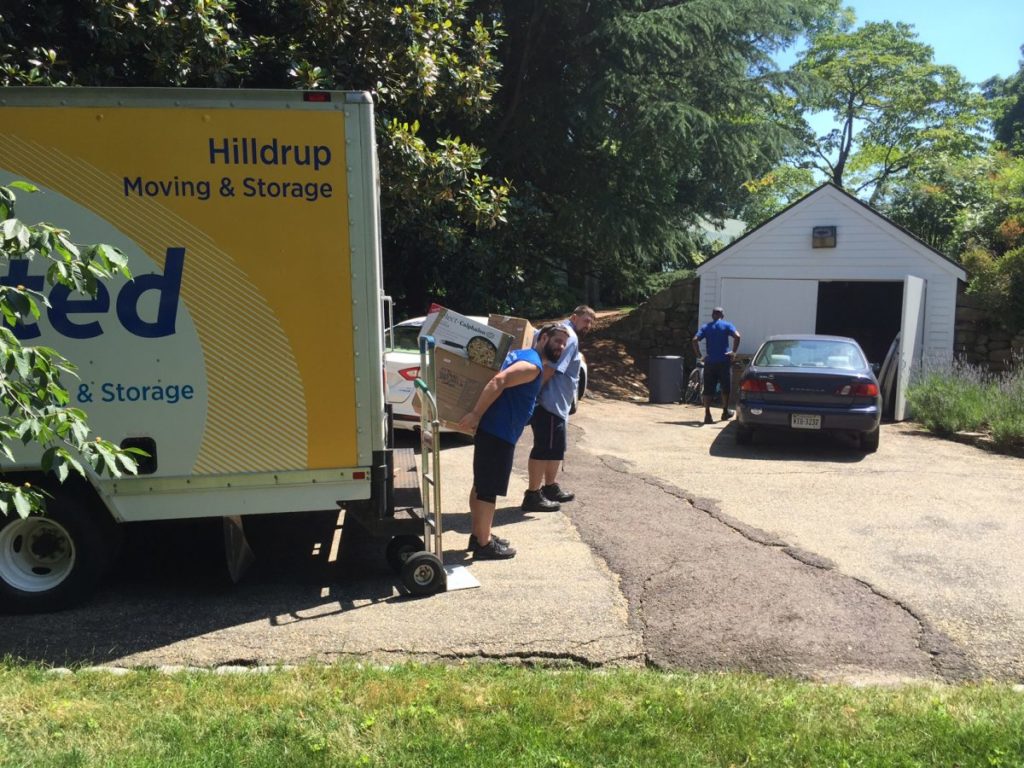 Hilldrup team unloading items from truck