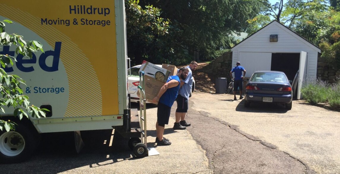Hilldrup team unloading items from truck
