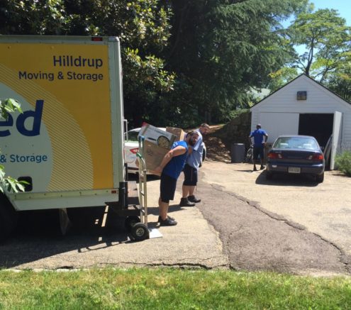 Hilldrup team unloading items from truck