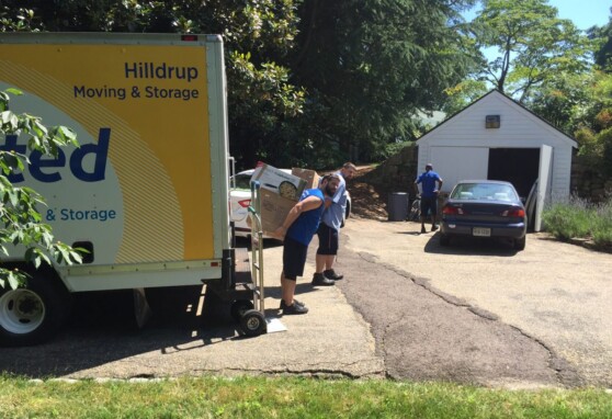 Hilldrup team unloading items from truck