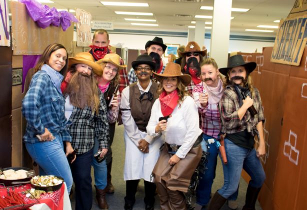 Hilldrup employees at Halloween dressed for the wild west
