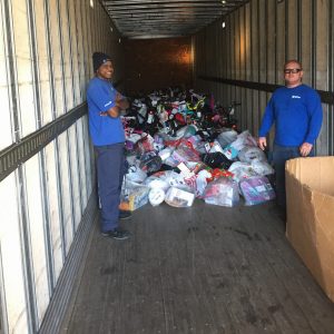 Donated gifts in Hilldrup truck for Operation Angel Tree