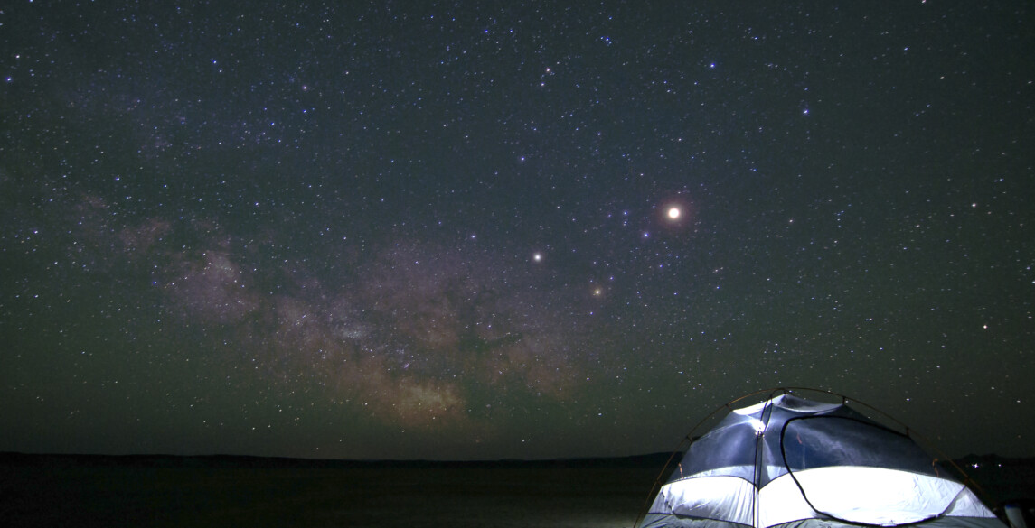 Tent under starry sky