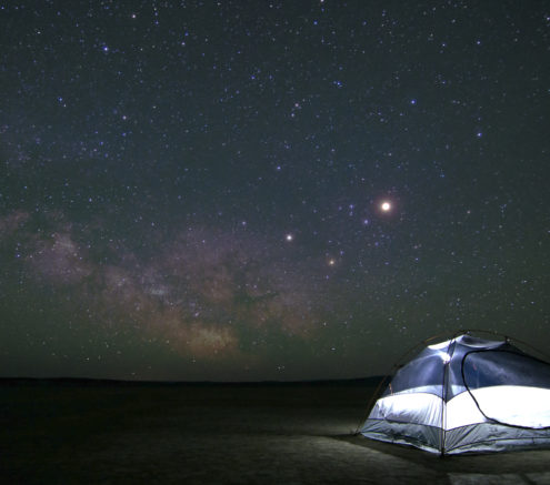Tent under starry sky