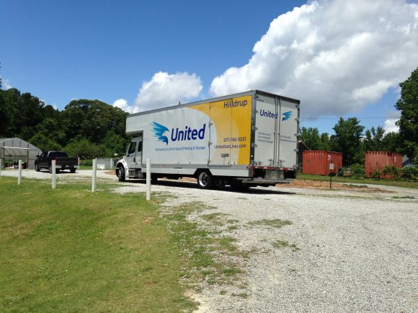 Aerial view of truck by garden