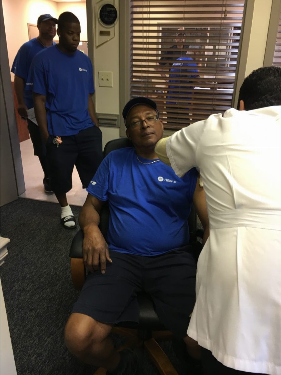 Employee receives flu shot
