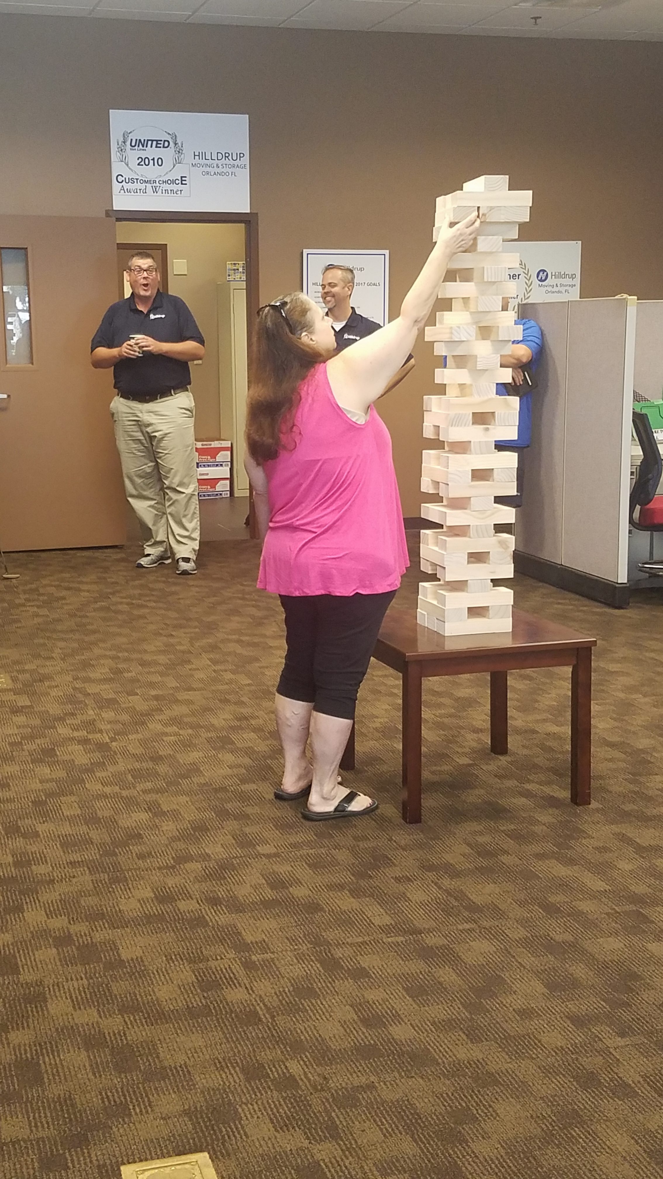 Employee plays Jenga