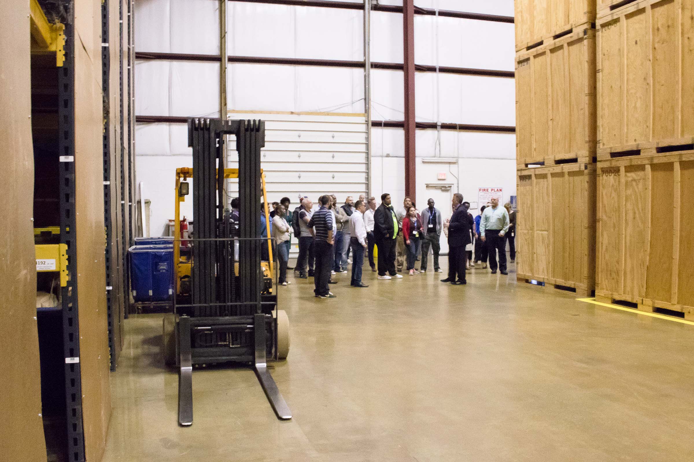 State Dept visit in warehouse