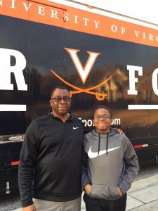 Mr. Williams and his son beside Hilldrup's custom UVA Truck