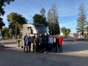 Visitors next to the Tesla Semi