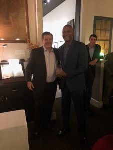 Nigel Kelly accepts sales award from Tom Hinkley