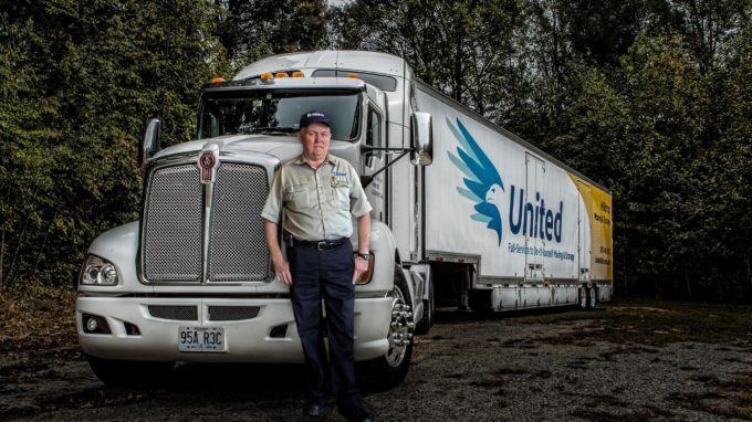 Johnny Abbott in front of his truck