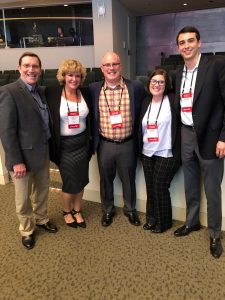 Cathy Whitener and her husband with Hilldrup team