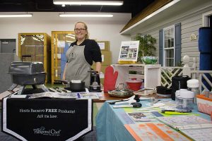 Hilldrup employee selling Pampered Chef items