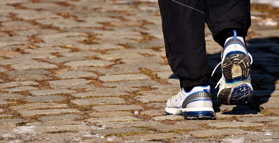 Person's sneakers in motion, running