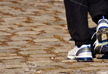 Person's sneakers in motion, running