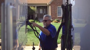 Bob Fitzgerald inspects moving truck