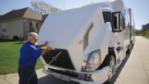 Bob Fitzgerald inspecting truck
