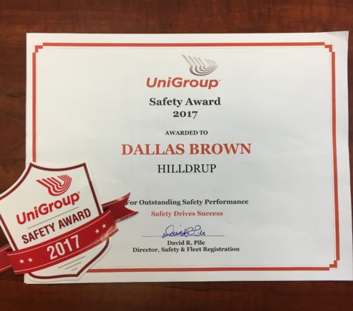 Dallas Brown with award from UniGroup