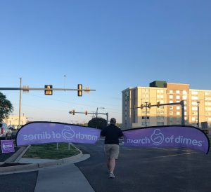Setting up March for Babies banners on street