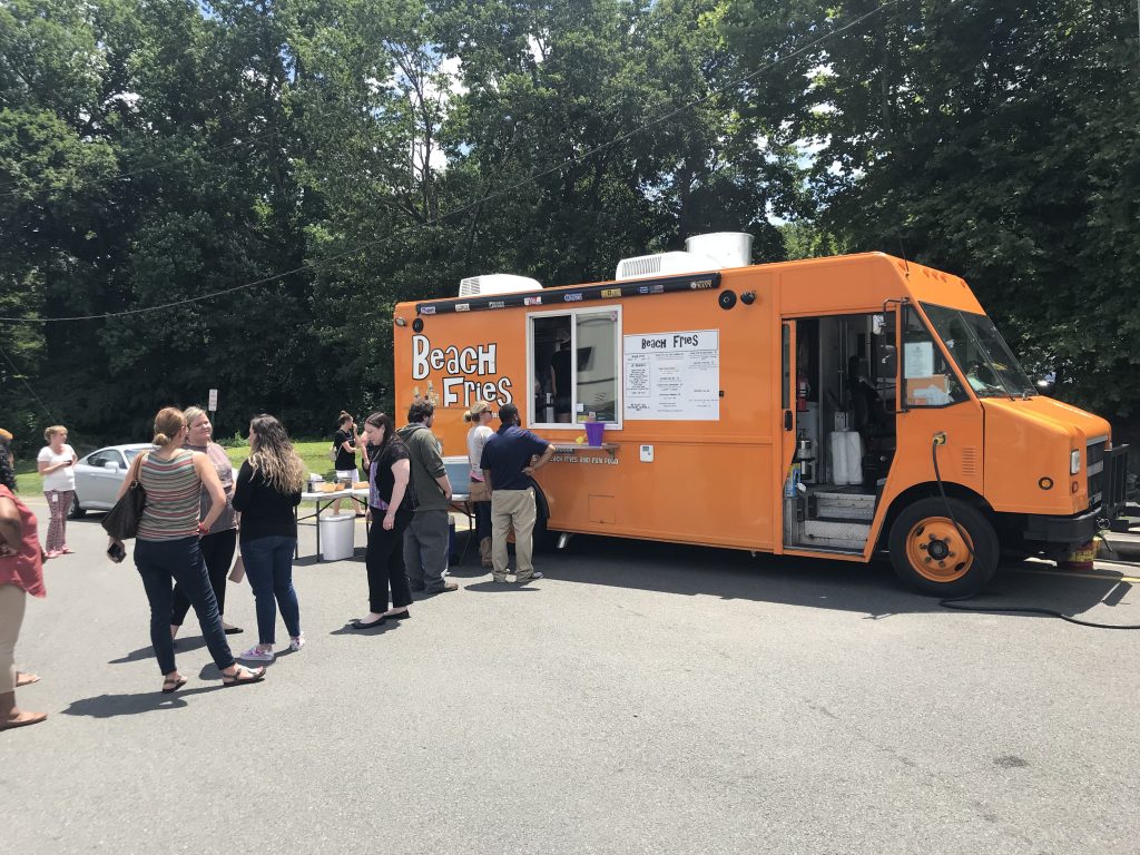 Stafford employees waiting in line at the Beach Fries food truck