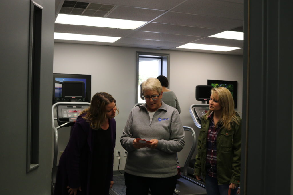Hilldrup employees work together to decipher clue in company gym
