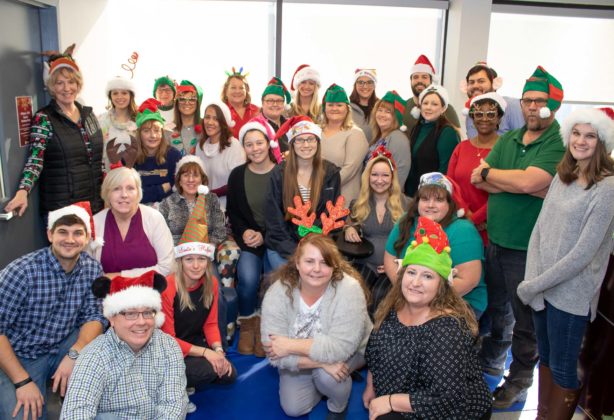 Hilldrup team wears festive hats for Christmas season