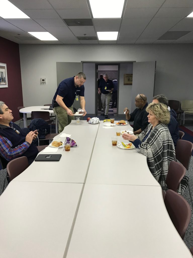 Greenville team enjoys a luncheon with one another