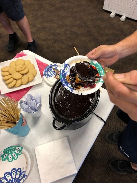 Hilldrup Orlando team with sweets on a table