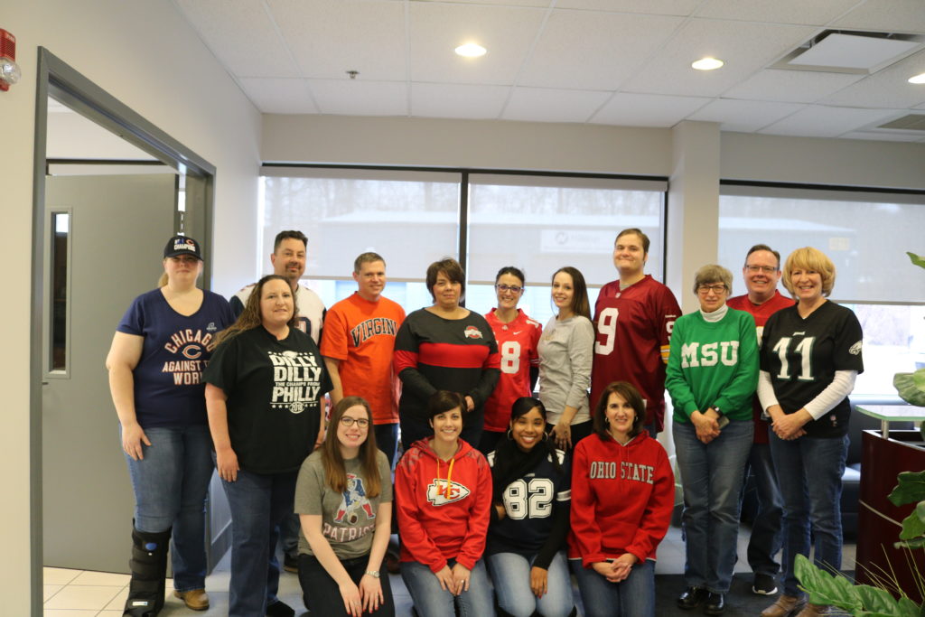 Hilldrup employees sporting their favorite sports teams