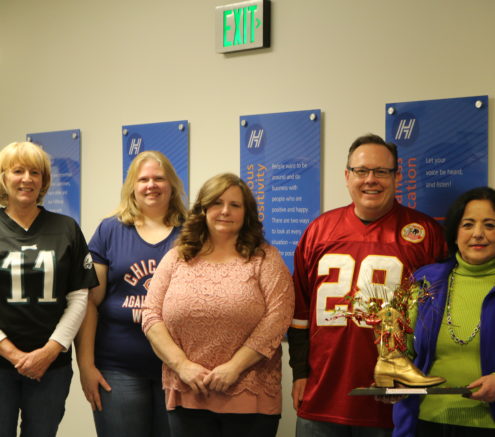 Hilldrup employees sporting their favorite sports teams