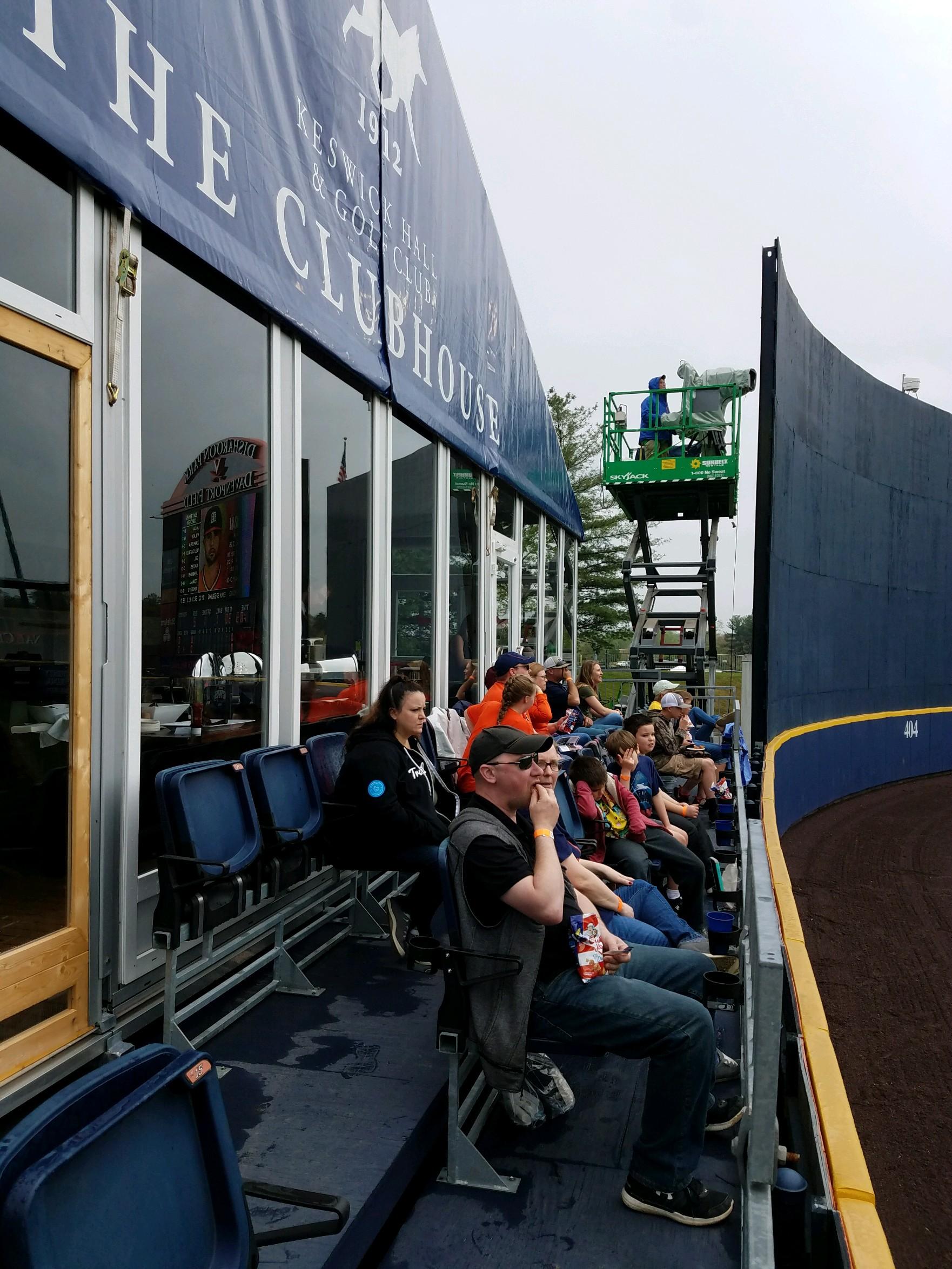 Group photo of Hilldrup employees and their kids in the club seats at UVA versus Miami baseball game