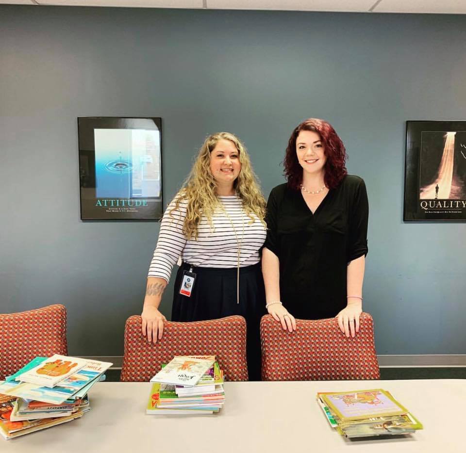Amanda Strawn with an RUW Rep during Hilldrup's book drive