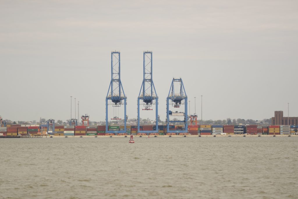 Tall shipping container cranes at cargo port in Baltimore