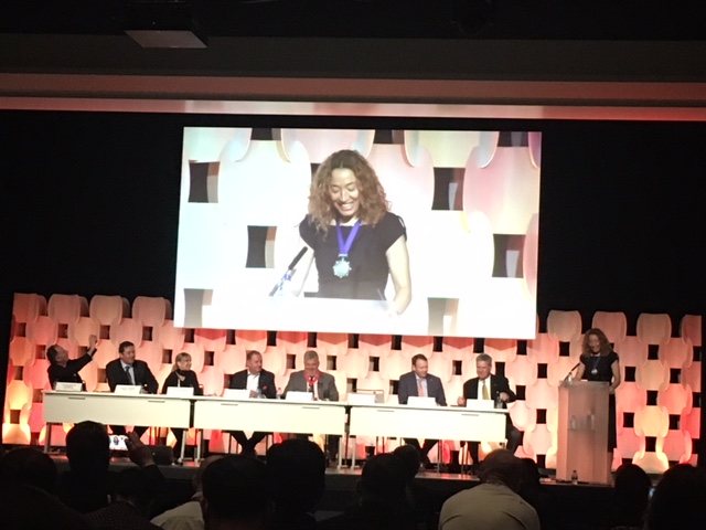 President of FIDI speaking at the podium during FIDI Conference
