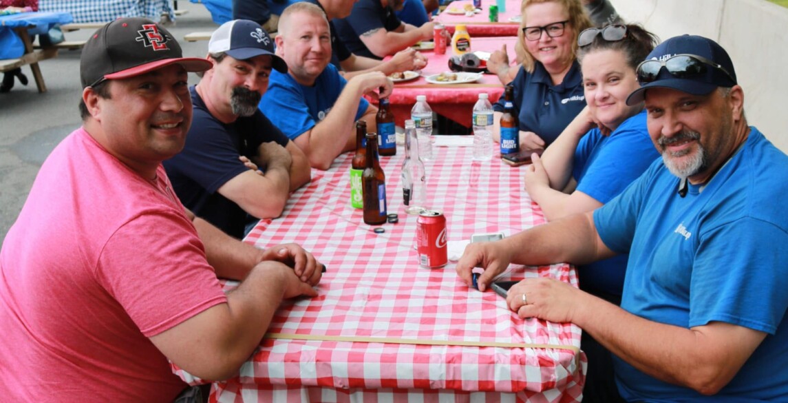 Hilldrup employees enjoy a BBQ outdoors