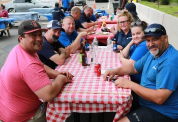 Hilldrup employees enjoy a BBQ outdoors