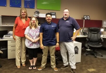 Hilldrup Orlando team members celebrate "Red Nose Day" by wearing red noses.