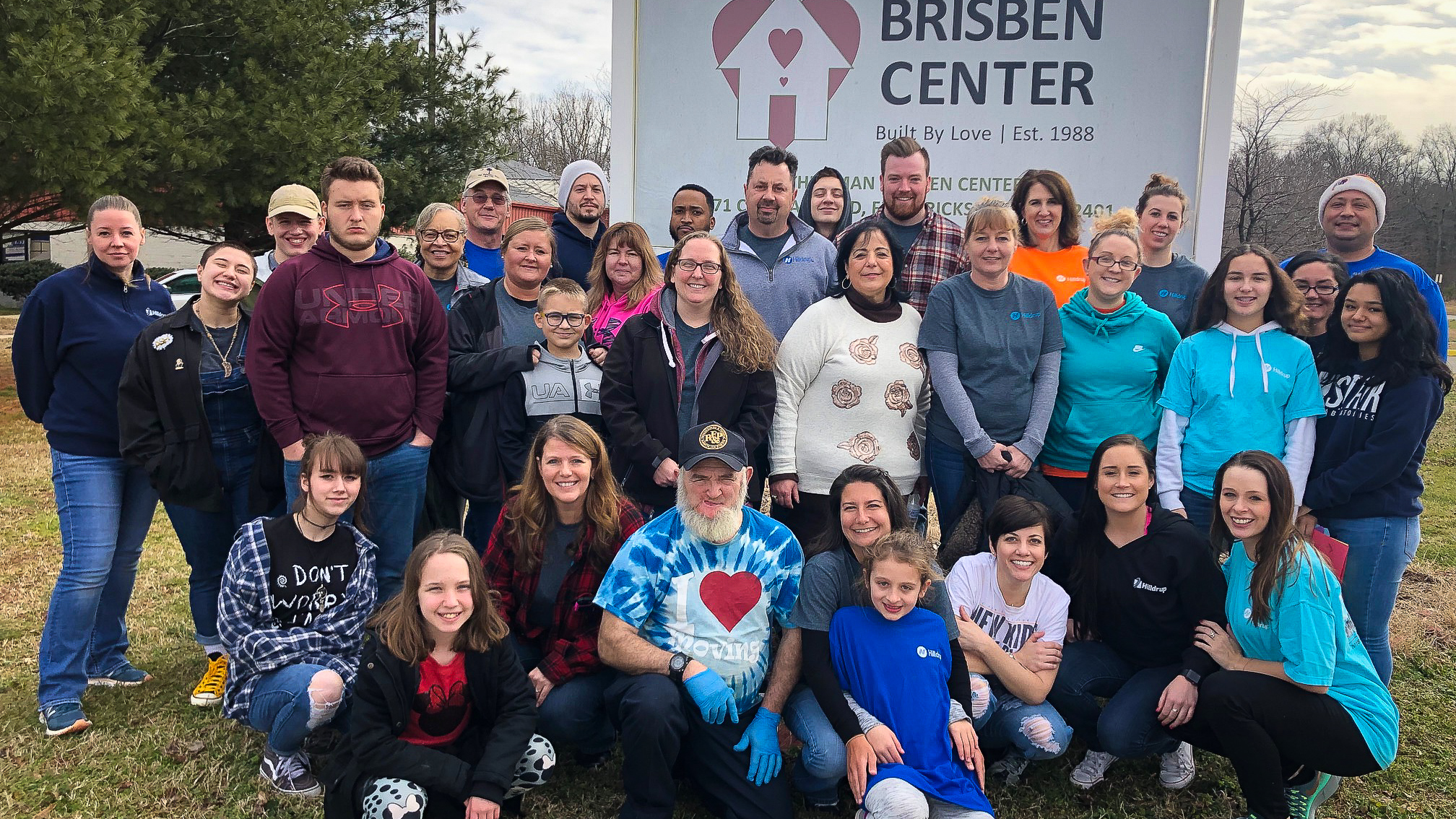 Hilldrup Stafford team gathers outside of Brisben Center