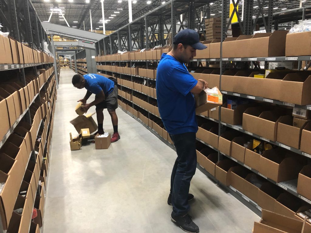 Hilldrup employees organize a facility's contents in Atlanta