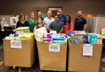 Hilldrup Orlando team members with donations supplied for the Hurricane Relief Fund