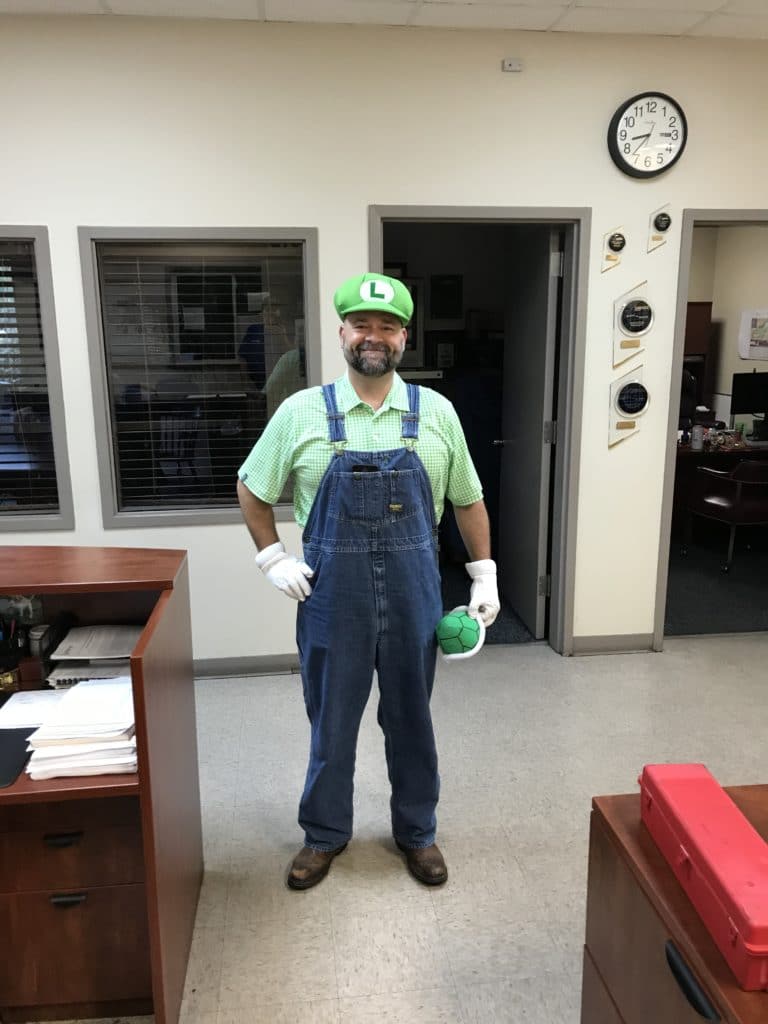 Jeremy Williams in our Raleigh office dressed as Luigi for Halloween 2019